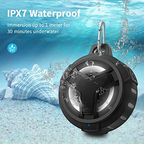 Waterproof Bluetooth speaker submerged underwater with IPX7 rating.